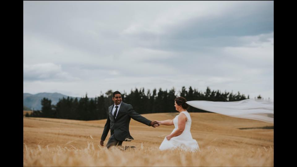 bride and groom wheat field